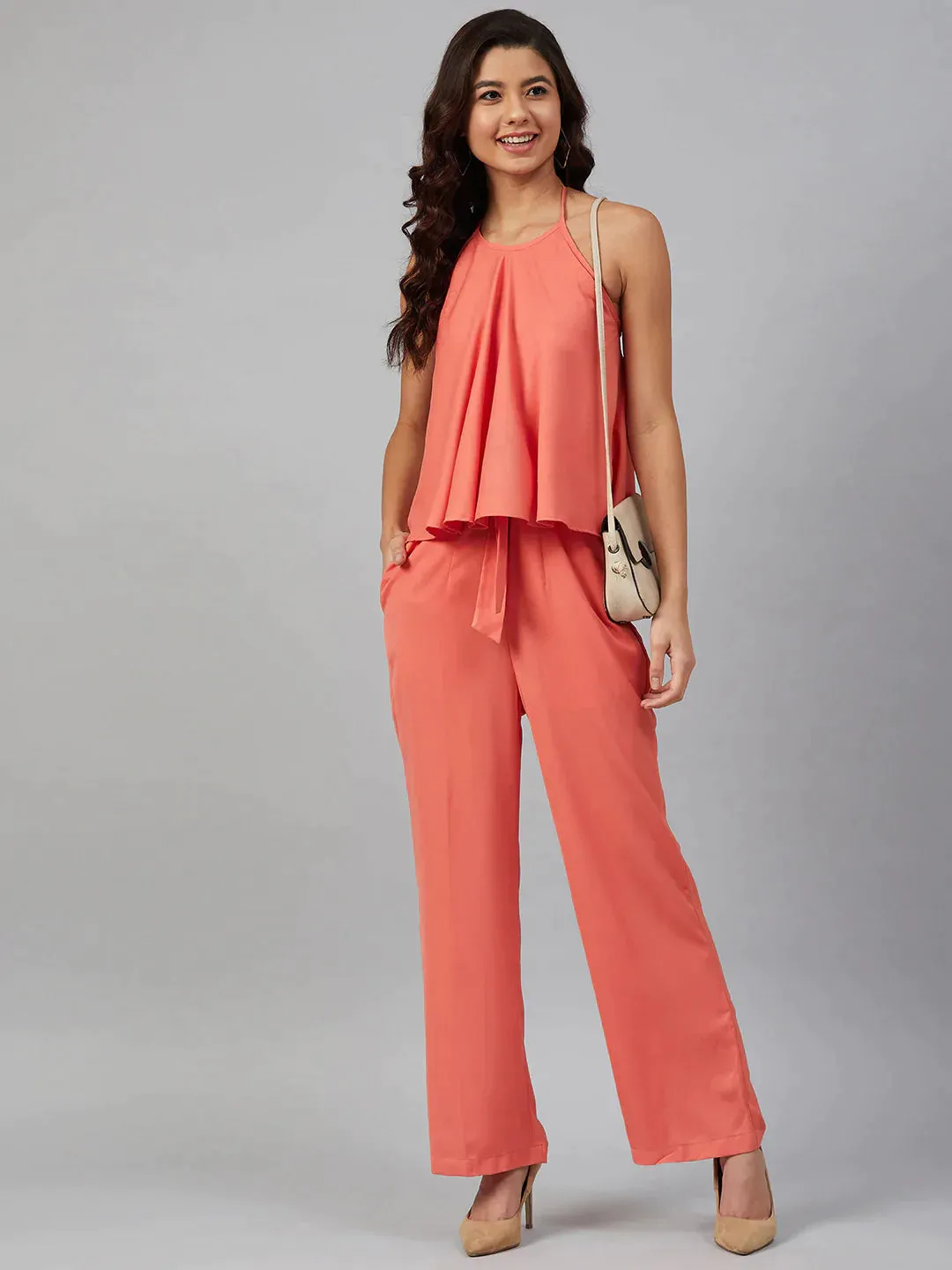 Women Peach-Coloured Solid Halter Neck Basic Jumpsuit